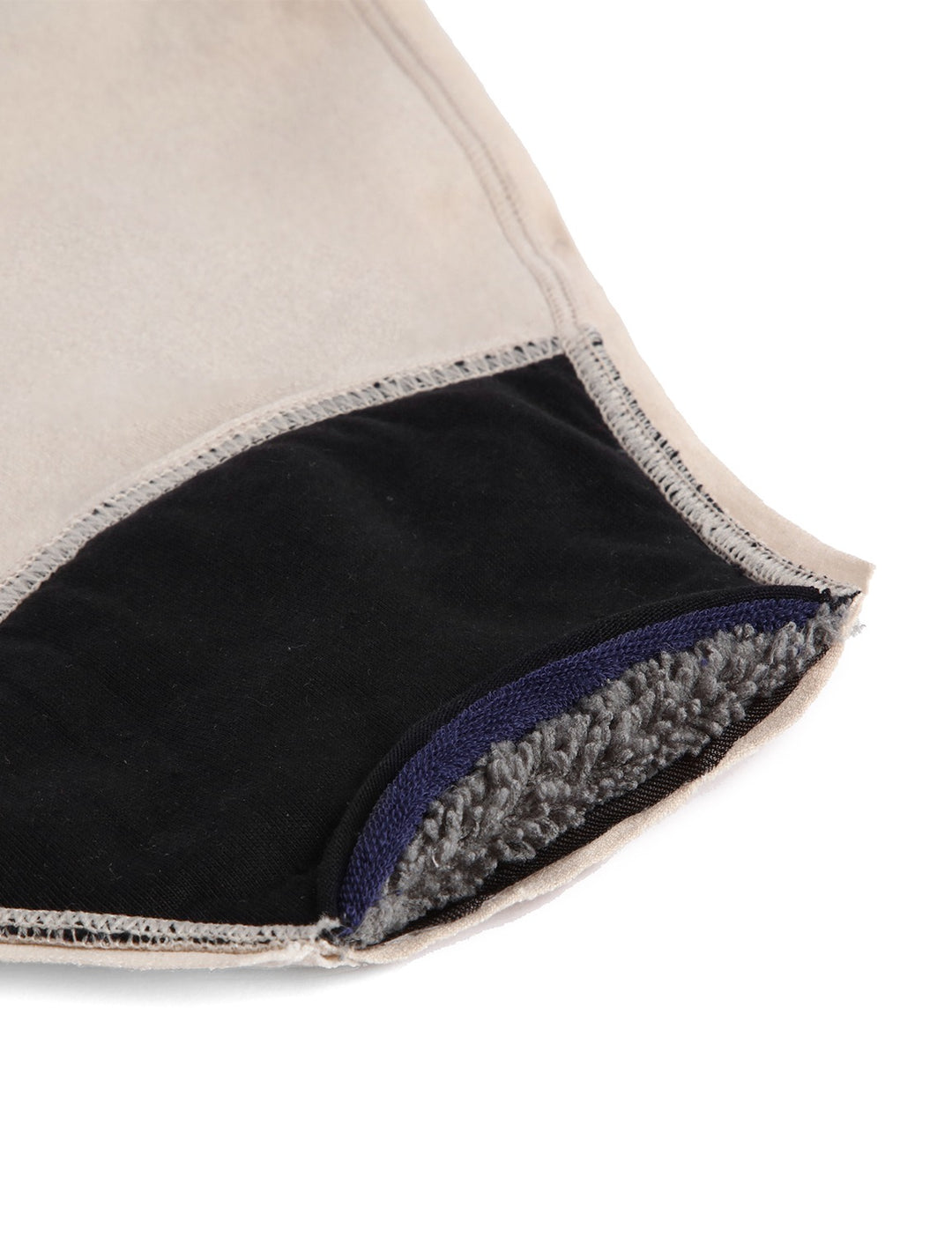 Heavy bikini bottoms hem detail: light beige outer with black lining and stitched edge