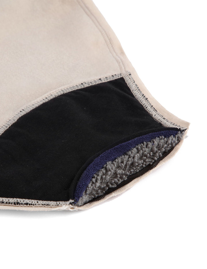 Heavy bikini bottoms hem detail: light beige outer with black lining and stitched edge