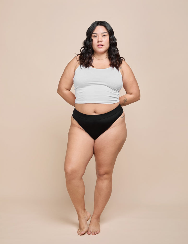 Light bikini with light gray scoop-neck top and black high-waist bottom