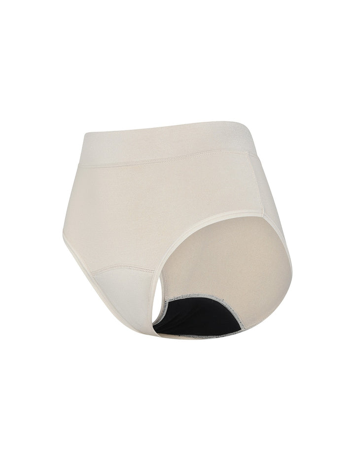 Heavy absorbency bikini in beige, angled view with black inner lining at the leg