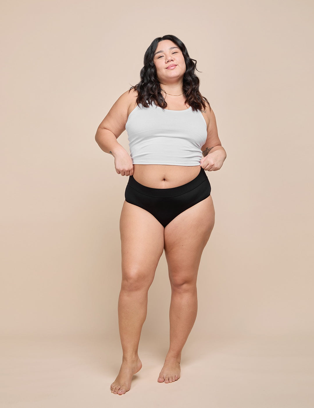 Black heavy absorbency brief, high-rise waistband and full-coverage leg