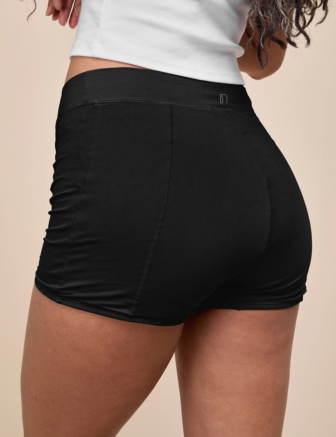 Black heavy absorbency short, close-up of contoured seams