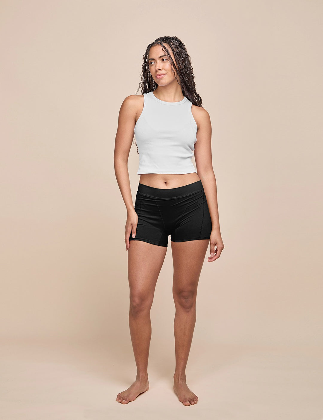 Model wearing the black heavy absorbency short with wide waistband